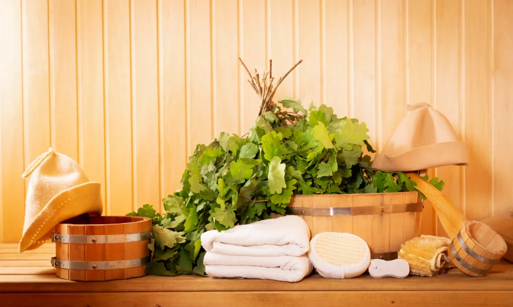 Sauna essentials arranged for a rejuvenating wellness experience reflecting longevity and energy.