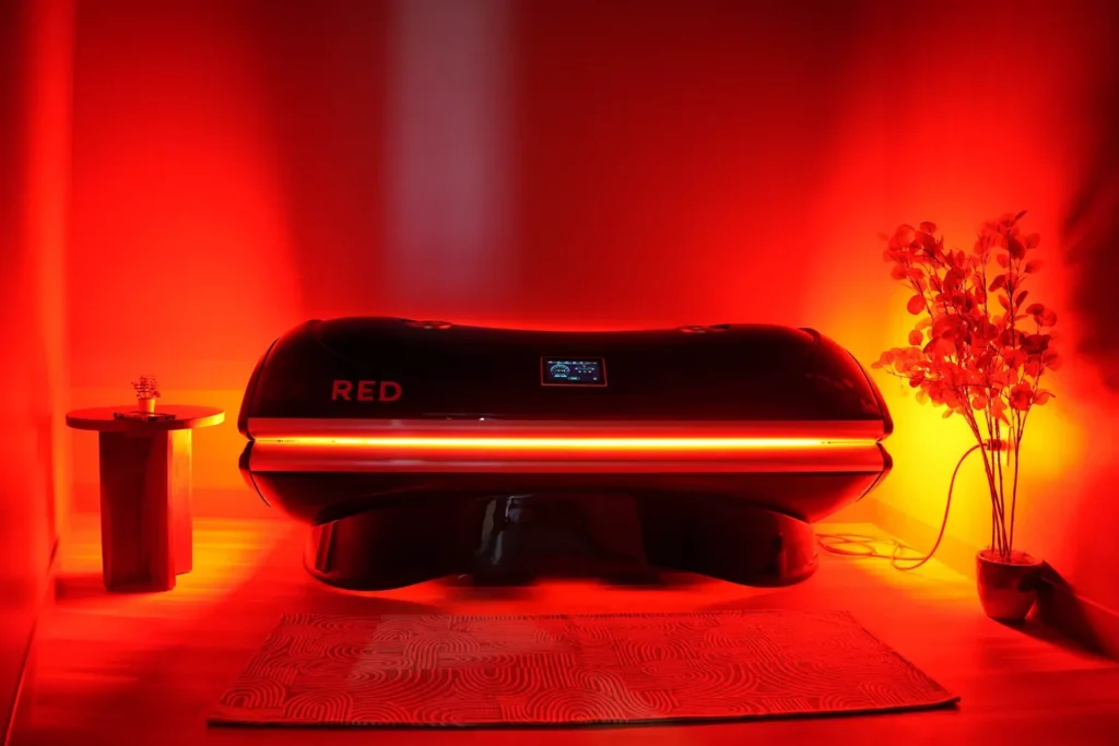 Red light therapy bed in its private room at Sisu Longevity Studio